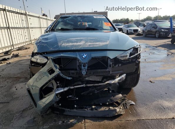 WBY43HD09SFU47703 2025 BMW I4 Teal Front view
