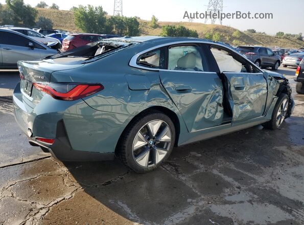 WBY43HD09SFU47703 2025 BMW I4 Teal Rear right
