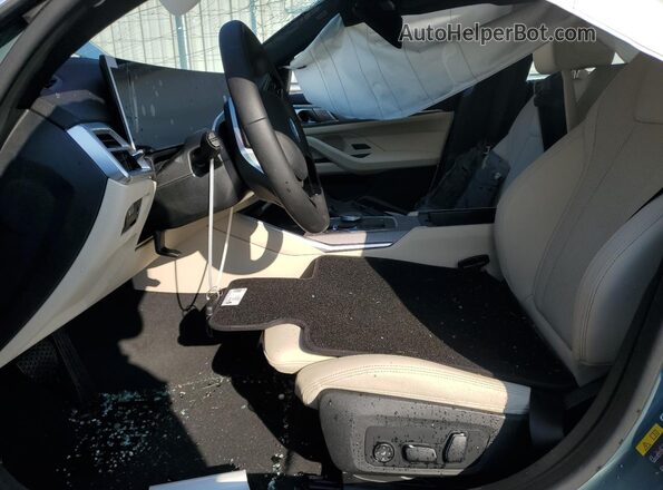 WBY43HD09SFU47703 2025 BMW I4 Teal Front interior view