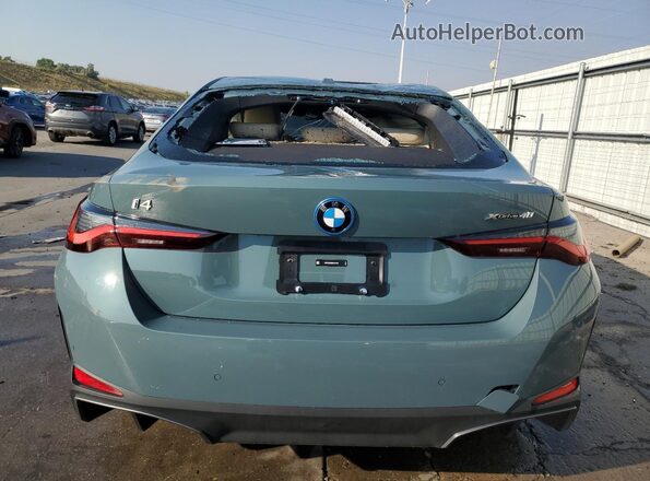 WBY43HD09SFU47703 2025 BMW I4 Teal Rear view