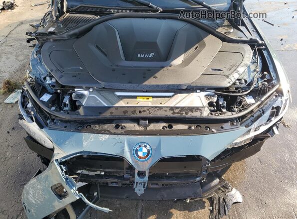 WBY43HD09SFU47703 2025 BMW I4 Teal Rear interior view
