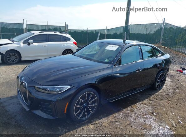 WBY73AW07NFN02994 2022 BMW I4 Black Przód lewy