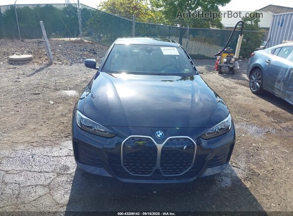 WBY73AW07NFN02994 2022 BMW I4 Black Widok wnętrza z tyłu