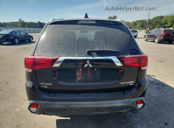 JA4AZ3A3XKZ039045 2019 MITSUBISHI OUTLANDER Black Widok wnętrza z przodu
