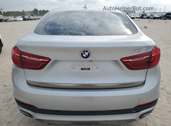 5UXKU0C53K0H99586 2019 BMW X6 Silver Widok wnętrza z przodu