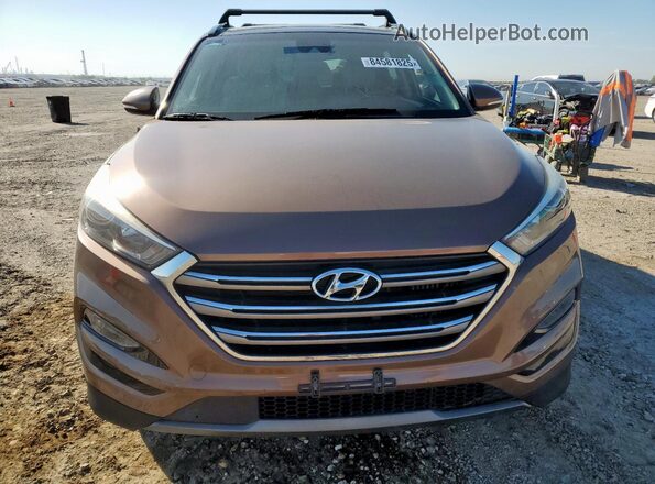 KM8J3CA27GU029538 2016 HYUNDAI TUCSON Brown 