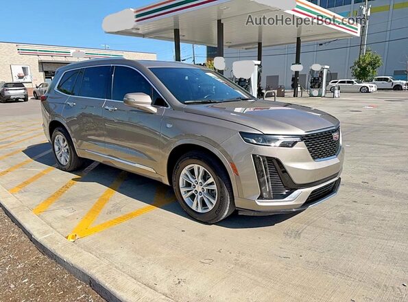 1GYKPAR43NZ182063 2022 CADILLAC OTHER Желто-коричневый 