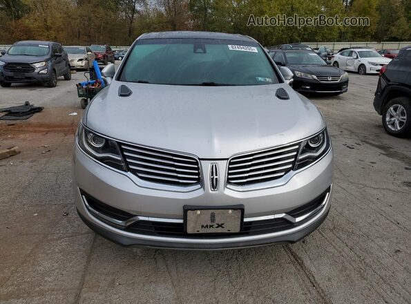 2LMTJ8KR2GBL70394 2016 LINCOLN MKX Серебряный Вид сзади