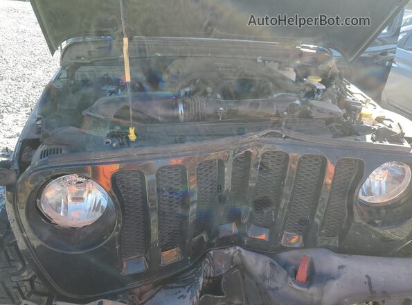 1C4GJXAG7LW273650 2020 JEEP WRANGLER Black Widok wnętrza z tyłu