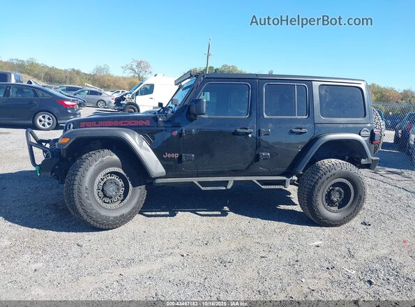 1C4HJXFNXMW546187 2021 JEEP WRANGLER UNLIMITED Black Widok wnętrza z tyłu