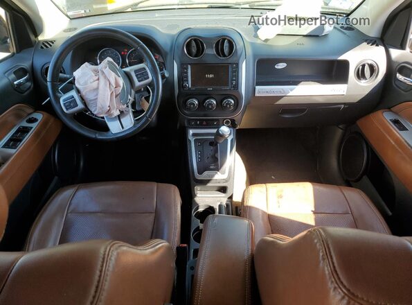 1C4NJDEB7GD724081 2016 JEEP COMPASS Черный Вид панели приборов