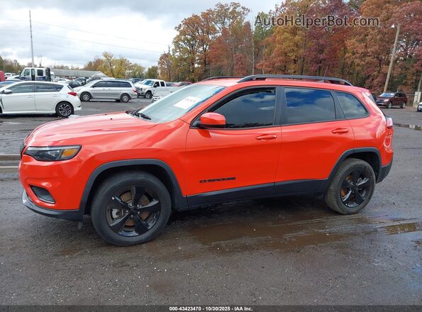 1C4PJMLBXMD142502 2021 JEEP CHEROKEE Orange Widok wnętrza z tyłu