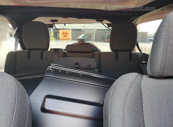 1C4RJXN65SW583515 2025 JEEP WRANGLER Red Vista de los asientos traseros