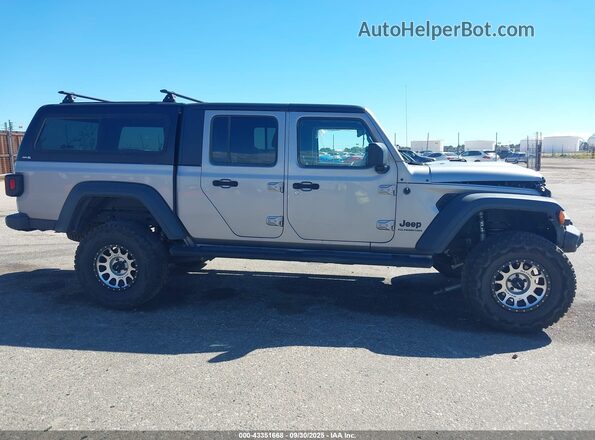 1C6HJTAG6LL108940 2020 JEEP GLADIATOR Gray Սալոնի հետևի տեսք