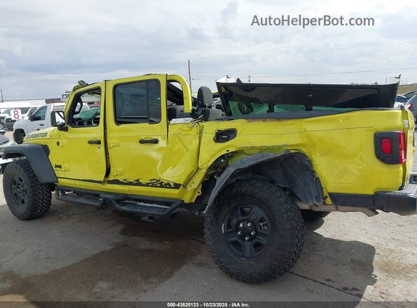 1C6HJTAG8PL568624 2023 JEEP GLADIATOR Yellow Rear interior view