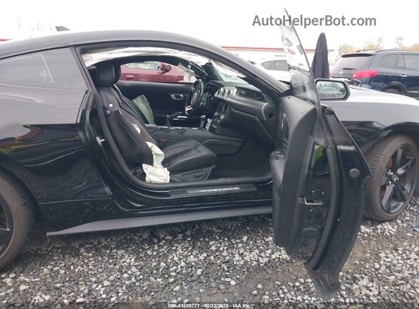 1FA6P8THXN5127859 2022 FORD MUSTANG Черный Вид салона спереди