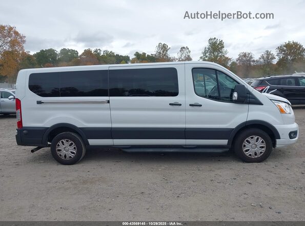 1FBAX2Y83LKA58493 2020 FORD PASSENGER White Вид задньої частини салону
