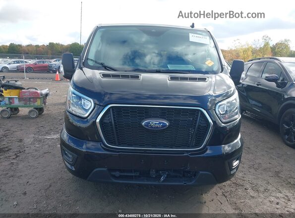 1FBAX9YG1RKB28338 2024 FORD PASSENGER Black Սալոնի հետևի տեսք