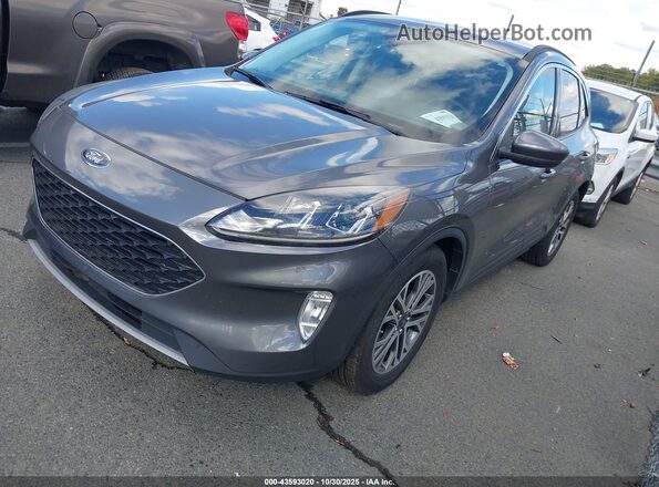 1FMCU0H67MUB25632 2021 FORD ESCAPE Gray 