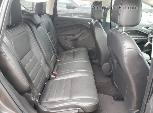 1FMCU0J9XHUD19775 2017 FORD ESCAPE Серый Вид задней части салона