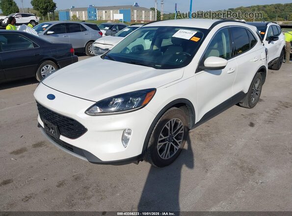 1FMCU9H65LUB03647 2020 FORD ESCAPE White Vista tres cuartos delantera izquierda