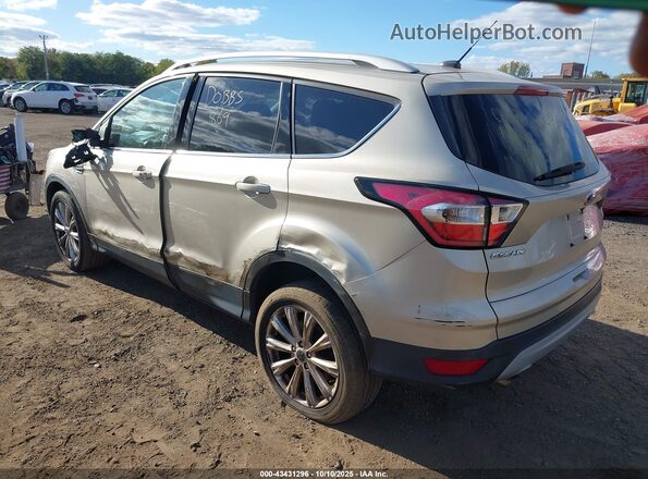 1FMCU9JD2HUD02056 2017 FORD ESCAPE Gold Front view