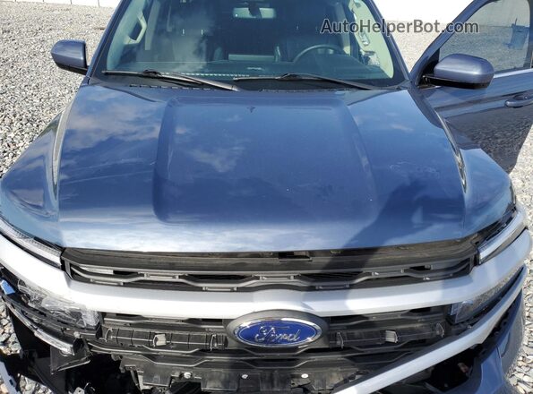 1FMJK1HT4NEA15626 2022 FORD EXPEDITION Blue Vista del compartimento del motor
