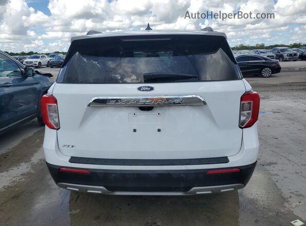 1FMSK7DH4RGA28864 2024 FORD FORD EXPLORER Белый Вид сзади