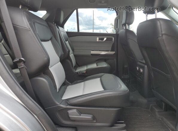 1FMSK8DHXRGA00976 2024 FORD FORD EXPLORER Silver Rear interior view