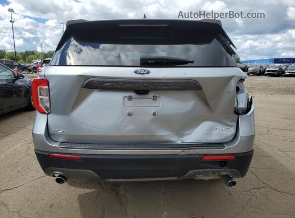 1FMSK8DHXRGA00976 2024 FORD FORD EXPLORER Silver Rear view