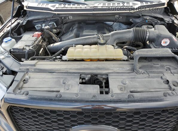 1FTEW1E43LFB16588 2020 FORD F150 Черный Вид задней части салона