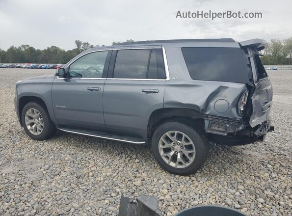 1GKS2DKC0LR125585 2020 GMC YUKON Blue Trasero izquierdo