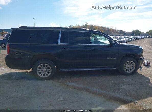 1GKS2GKC7LR205872 2020 GMC YUKON Black Widok wnętrza z tyłu