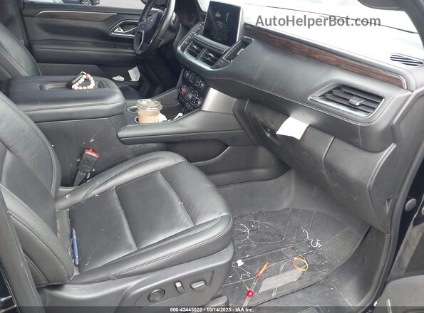 1GNSCNKD4MR464317 2021 CHEVROLET TAHOE Black Front interior view