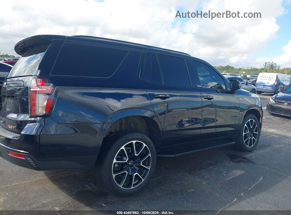 1GNSCRKD2RR213259 2024 CHEVROLET TAHOE Blue Rear interior view