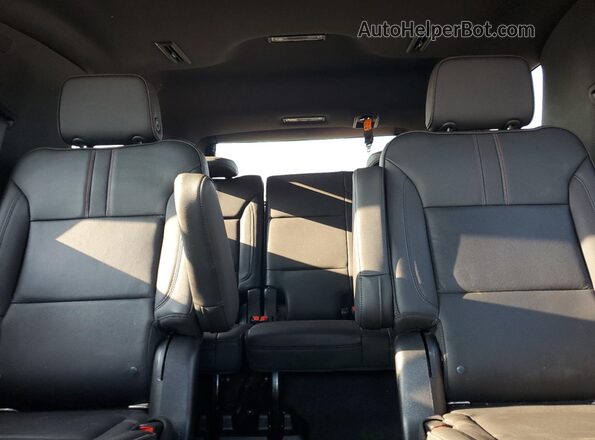 1GNSCRKD9MR468497 2021 CHEVROLET TAHOE Black Widok tylnych siedzeń