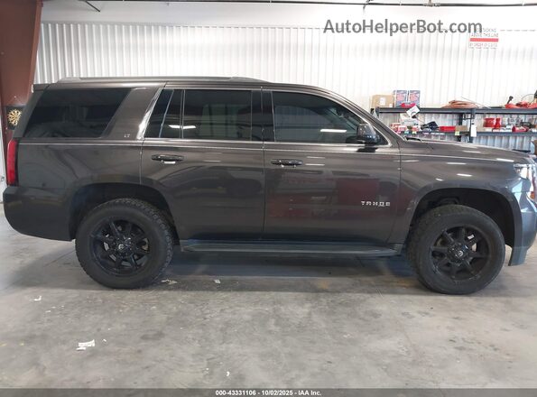 1GNSKBKC0JR384646 2018 CHEVROLET TAHOE Gray Vista interior trasera