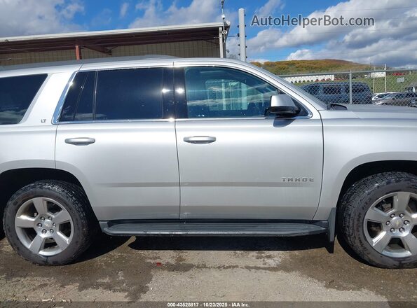 1GNSKBKC4LR130084 2020 CHEVROLET TAHOE Silver Rear interior view
