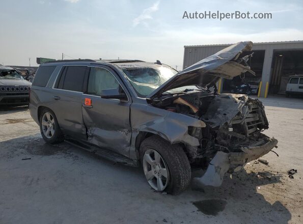 1GNSKBKC6LR187208 2020 CHEVROLET TAHOE Gray Delantero derecho