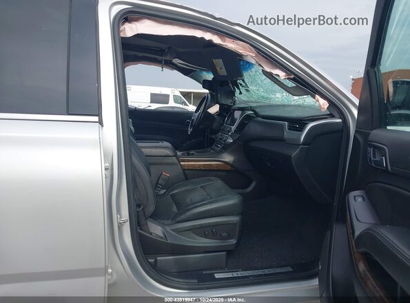 1GNSKBKC9LR243576 2020 CHEVROLET TAHOE Серебряный Вид салона спереди