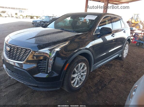 1GYAZAR45PF110520 2023 CADILLAC XT4 Black 