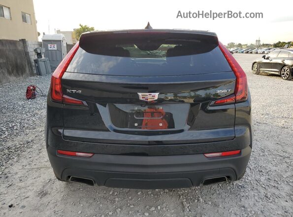 1GYAZAR48PF177404 2023 CADILLAC XT4 Black Widok z tyłu