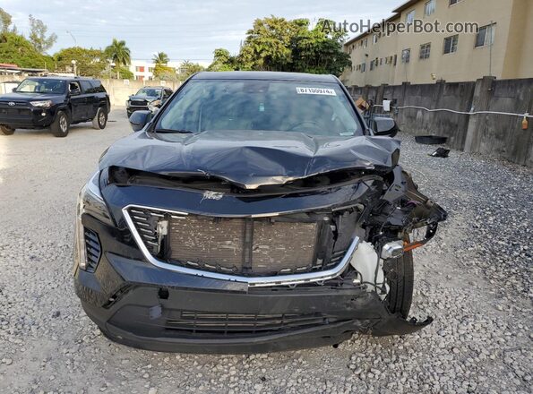 1GYAZAR48PF177404 2023 CADILLAC XT4 Black Widok z przodu