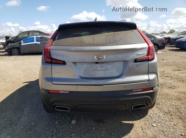 1GYFZBR4XPF221205 2023 CADILLAC XT4 Серебряный Вид сзади