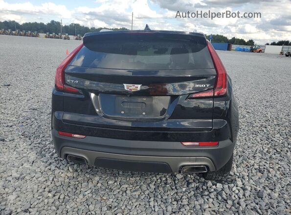 1GYFZCR42LF044066 2020 CADILLAC XT4 Black Rear view