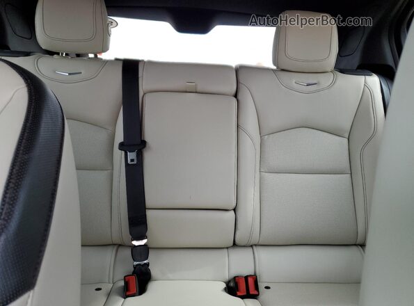 1GYFZER41KF124341 2019 CADILLAC XT4 Red Вид задніх сидінь