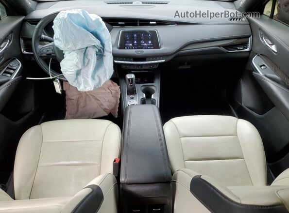 1GYFZER41KF124341 2019 CADILLAC XT4 Red Вид панелі приладів