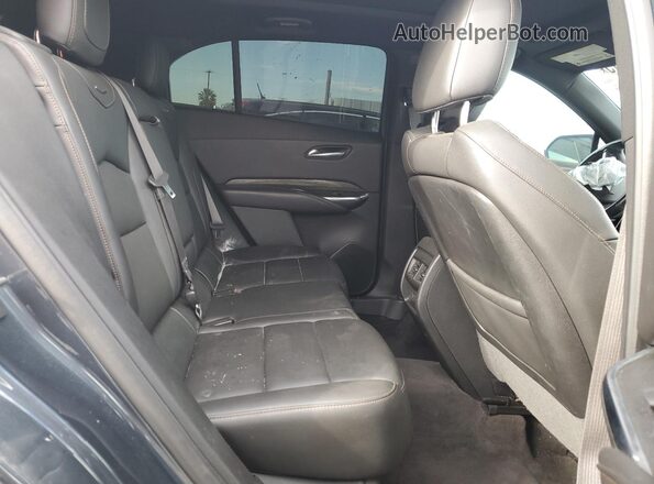 1GYFZER41LF020790 2020 CADILLAC XT4 Gray Widok wnętrza z tyłu