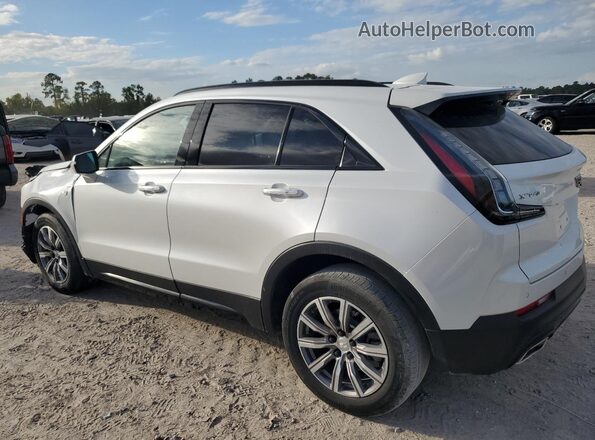 1GYFZER42NF100375 2022 CADILLAC XT4 White Tył lewy