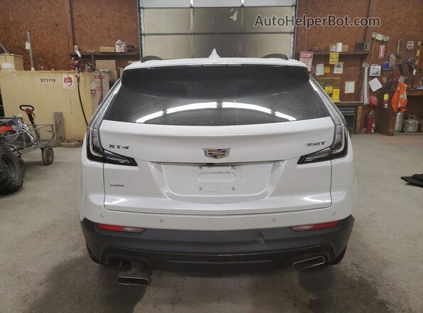 1GYFZFR44PF105666 2023 CADILLAC XT4 White Widok z tyłu